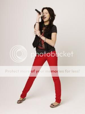 http://i525.photobucket.com/albums/cc335/mileyluva96/photoshoot03.jpg