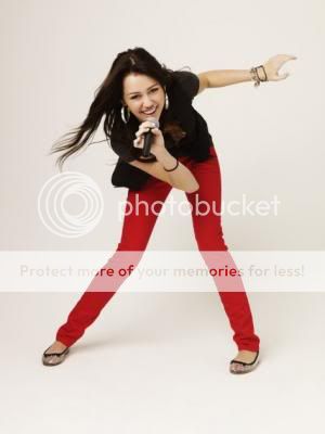 http://i525.photobucket.com/albums/cc335/mileyluva96/photoshoot12.jpg